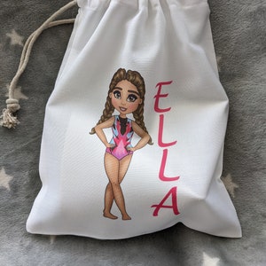 Personalised gymnastics drawstring bag, white,  25cm x 30cm (approx), with choice of 36 gymnasts. Pink, black and turquoise leotard.