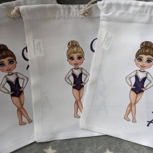 Personalised gymnastics drawstring bag, white,  25cm x 30cm, with choice of 36 gymnasts. Blue, white silver leotard.