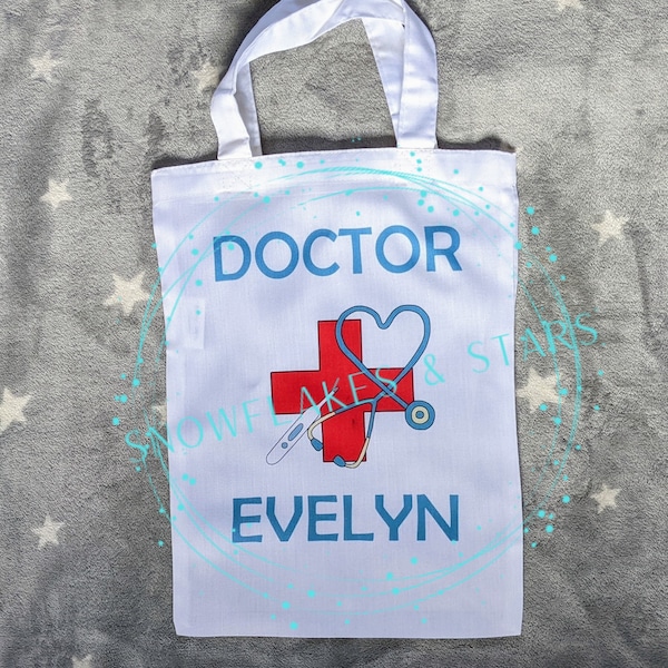 Personalised child's doctor's bag with red cross, stethoscope and thermometer design. Perfect for role play and dressing up.