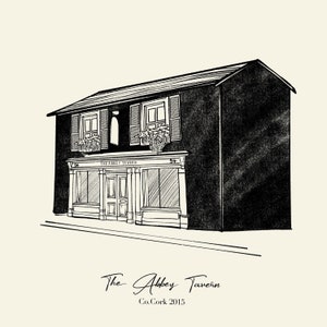 May include: Black and white pen and ink illustration of The Abbey Tavern, a two-story building with a pitched roof. The building has windows with shutters and flower boxes. The text "The Abbey Tavern" and "Co. Cork 2015" are at the bottom.