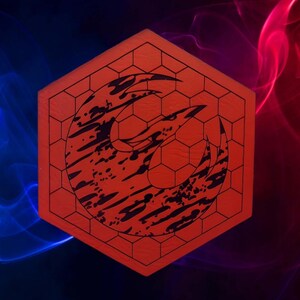 May include: A red, hexagonal coaster featuring a black graphic design. The design is a stylized bird or emblem within a honeycomb pattern. The background has blue and red abstract shapes.