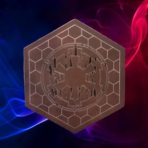 May include: A brown, hexagonal emblem with a detailed, etched design. The central image is a stylized starburst within a circle, surrounded by a honeycomb pattern. The background features blue and red abstract shapes.