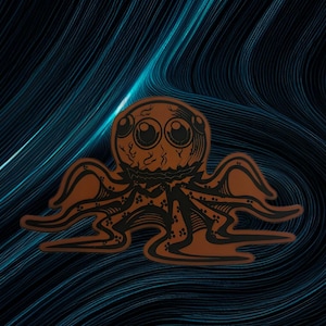 May include: A brown octopus sticker with a cartoon design. The octopus has large eyes and a smiling mouth. The tentacles are flowing. The background is a dark blue with wavy lines.