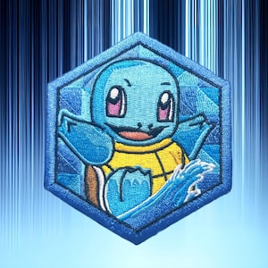 May include: A blue embroidered patch in a hexagonal shape featuring a cartoon Squirtle character. The Squirtle is light blue with a yellow belly and brown shell. The patch has a blue border and is set against a blue gradient background.