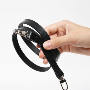 Schwarzer Ledergurt - Schultergurt / Crossbody-Riemen aus schwarzem Leder 90 x 1,5cm silberfarbener Ersatzriemen