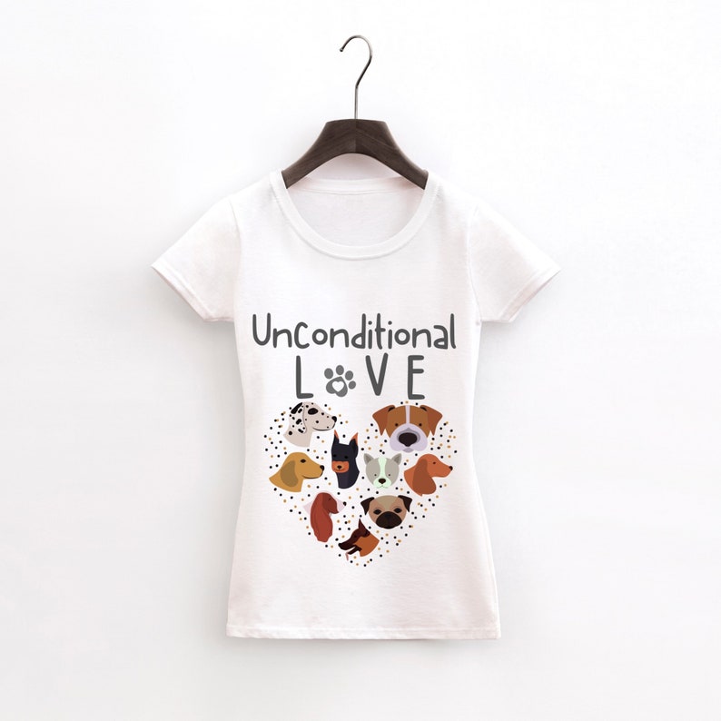 May include: White t-shirt with a grey graphic of a heart made of dog faces and the text "Unconditional LOVE" with a paw print in the O.