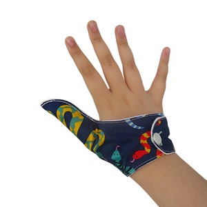 Thumb-sucking habit breaker. A Fabric thumb glove with moisture-resistant lining to help stop thumb sucking habits