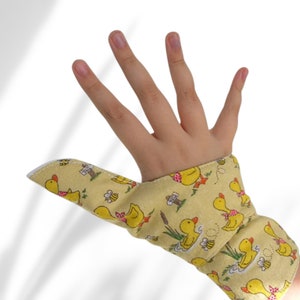 Flannelette Thumb Guard suitable for babies, toddlers. Thumb guard with arm cuff to help keep the guard in place.