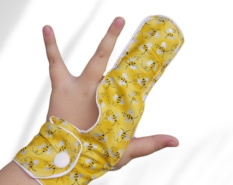 Finger guard. Various designs, Gentle Fabric Finger Guards: Break the Finger-Sucking Habit Safely. May be pulled off by babies and toddlers.