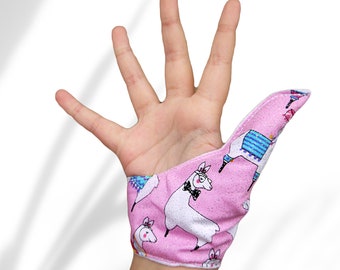 Thumb guard in a llama themed fabric with moisture resistant lining, help stop thumb sucking. May be pulled off by babies and toddlers