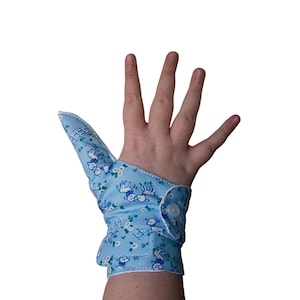 The Thumb guard specifically designed for younger children, with a second cuff to reduce easy removal. Stop thumb-sucking habits.