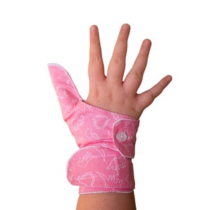 The Thumb guard especially designed for younger children, with a second cuff to reduce easy removal. Stop thumb-sucking habits.