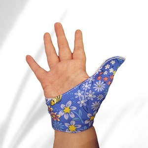 Help stop thumb-sucking and other habits, cloth glove, moisture-resistant lining. Thumb-sucking habit breaker. Babies & toddlers may remove.