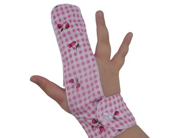 Finger guard. Fabric finger glove to help stop finger sucking and other habits. May be pulled off by babies & toddlers.