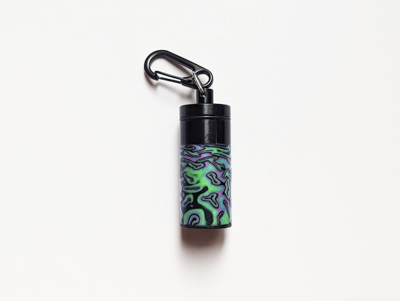 UV Stash Box, Psychedelic Portable Earplug Container, Blue Turquoise with Necklace or Clip. Black Carabiner Clip