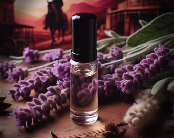 May include: A small clear glass bottle with a black cap filled with a light brown liquid. The bottle is sitting on a brown surface with lavender flowers and star anise.