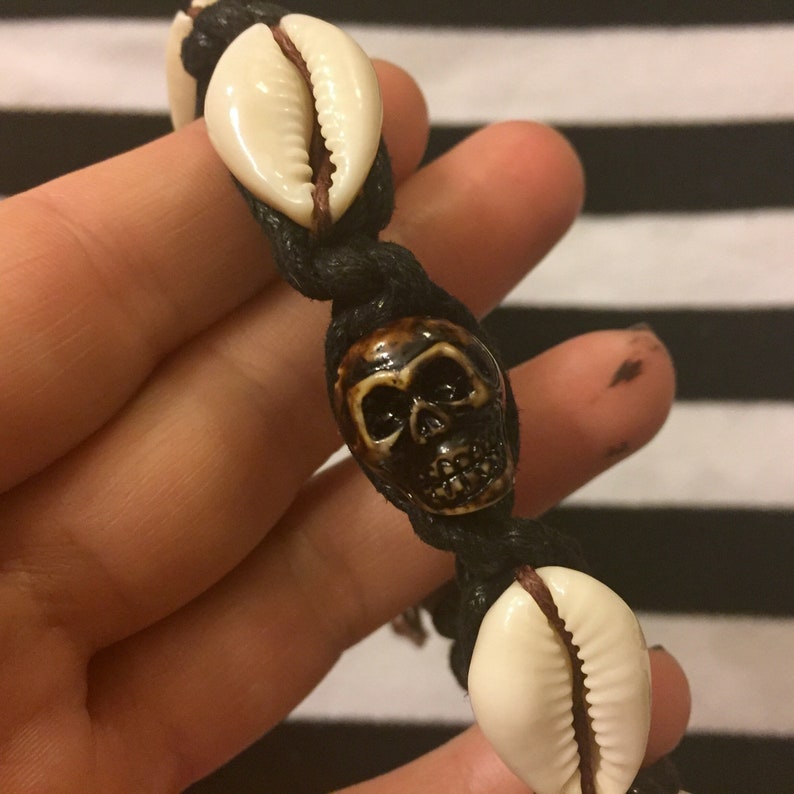 Bracelet with Brown and Black Cord Resin Skull Macrame Detailing Ocean Hawaiian Beach Surfer Punk Rock Music Fashion Scene Cowrie Shells