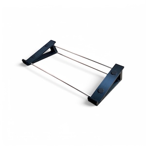 May include: A black laptop stand with two metal bars. The stand is made of plastic and has a textured surface.