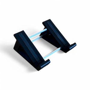 May include: A black adjustable laptop or tablet stand featuring two triangular side supports connected by two horizontal clear rods. The stand has a slanted design with small front lips to hold a device securely in place while in use.