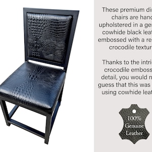 May include: Black dining chair with a crocodile embossed leather seat and back. The chair has a black metal frame. The chair is 100% genuine leather.