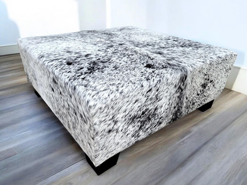 custom made cowhide ottoman 
Cowhide coffee table