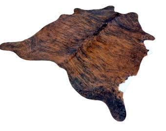 Medium - Large sized brindle and white Genuine Cowhide Rug, Hair on Hide, Sold as seen