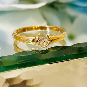 9ct Gold and Diamond ring SIZE N 1/2