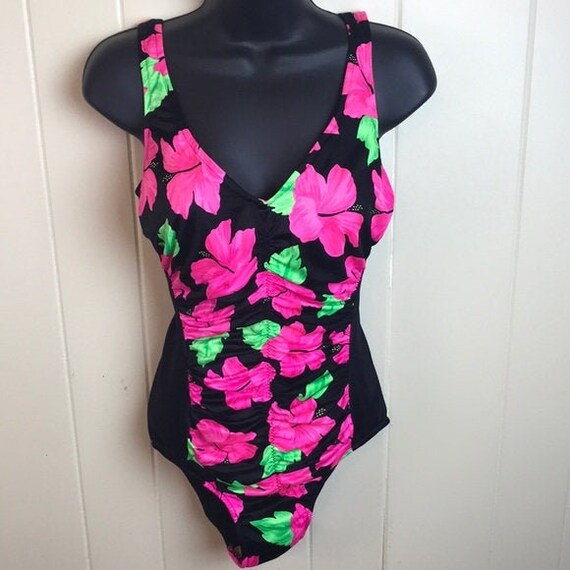 black swimsuit with pink flowers
