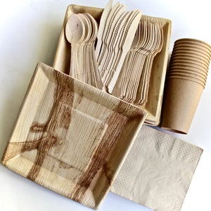 May include: A set of disposable tableware made from palm leaves, including plates, forks, spoons, and a cup. The tableware is brown and natural in color.