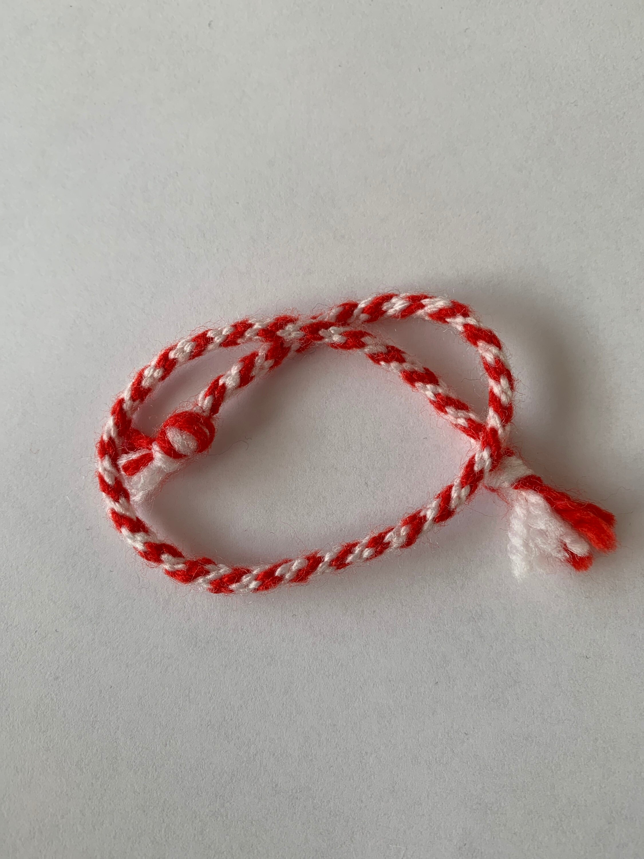 Red and white string bracelet best sale