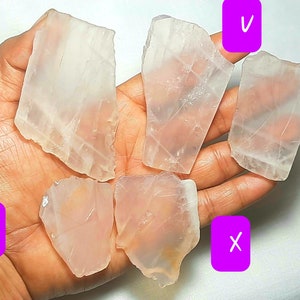 May include: Six pieces of clear, translucent selenite crystal, some with a slight pink hue, arranged on a hand. The crystals are labeled with letters U, V, W, X, Y.
