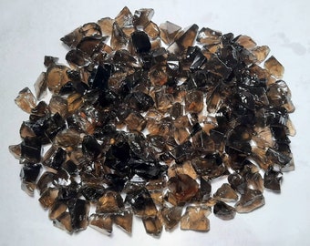 Esemplari di quarzo fumé grezzo AAA (da 6x4 a 15 x 20 mm)