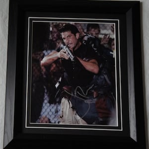 Authentic JON BERNTHAL signed Licensed Photo The Walking Dead.  Authentic signed photo. Not a copy or print Registered Dealer