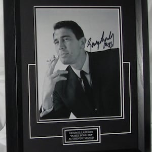 George Lazenby Signed  James Bond OHMSS 1969  Mounted  Framed Authentic not copy or print Registered Dealer