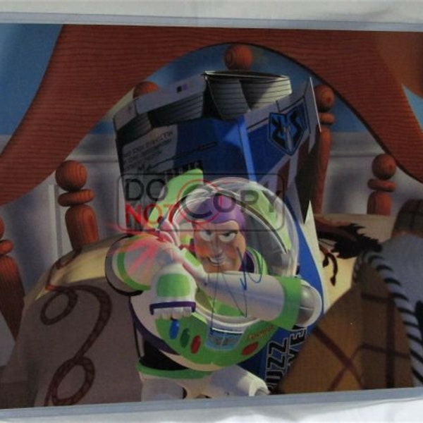 Tim Allen signed 14 x 11  "Buzz Lightyear Toy Story" authentic 14 x 11 photo. Not a copy or print. AFTAL Registered Dealer #199