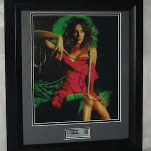 KATE BECKINSALE 正規登録ディーラーのサイン入り。コピーや印刷されたサインではありません。