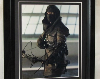 JOHN BARROWMAN Signed  Arrow guaranteed authentic. Hand matted and framed.  Registered Dealer  Not Copy or Printed