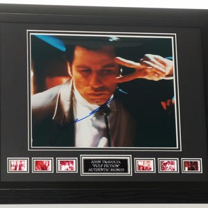 JOHN TRAVOLTA signed Pulp Fiction  Mounted with 1994 old Film Cells. Framed Unique item