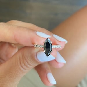 Marquise Cut Black Diamond Ring with White side diamonds in 14k rose gold. Beautiful and Delicate and Yet, So Special!!!