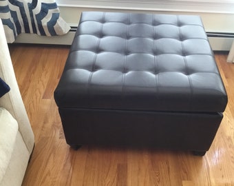Leather ottoman with storage