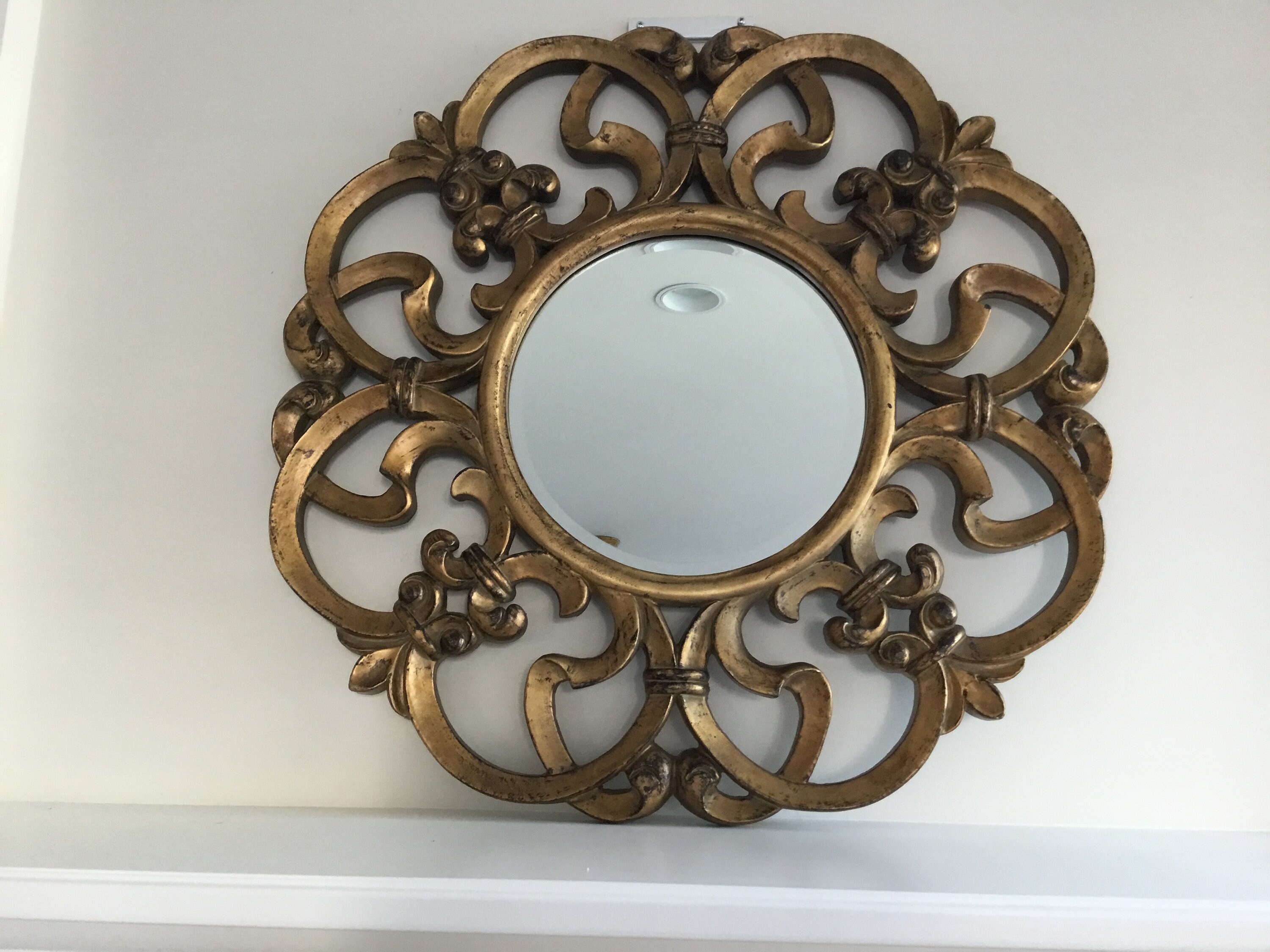 Round Gold mirror with open swirl cutouts Etsy