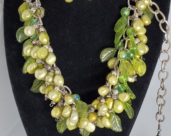 Handmade OOAK green freshwater pearl necklace with green glass leaves on a silvertone chain with matching earrings