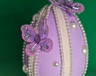 Lavendar Easter egg decorated with velvet ribbon, pearl chain, pearl polka dots and lavendar butterlies (5" egg)