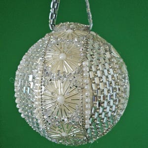 Simple and elegant describes this pearl and rhinestone Christmas or wedding ornament (3&quot; ball)