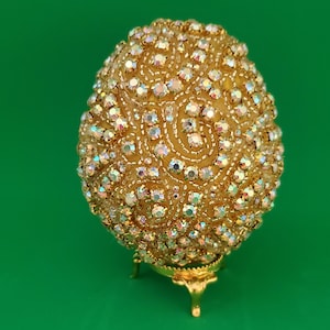 AB rhinestones and gold beads completely cover this OOAK handmade Easter egg with stand (3&quot; egg)