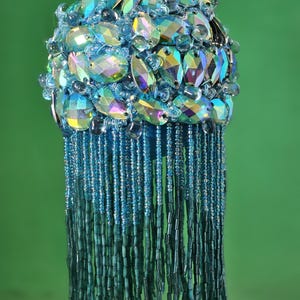 Gorgeous AB turquoise jewels envelope this Christmas ornament with 4&quot; variegated ombre beaded fringe in sparkle galore (3&quot; ball)