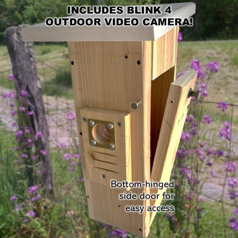 May include: A wooden birdhouse with a side door that opens for easy access. The birdhouse is designed to hold a Blink 4 outdoor video camera. The text "INCLUDES BLINK 4 OUTDOOR VIDEO CAMERA!" is printed on the top of the birdhouse.  "Bottom-hinged side door for easy access" is printed on the side of the birdhouse.