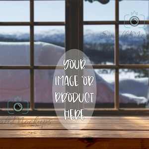 May include: A wooden table with a rustic finish sits in front of a window with a view of a snowy landscape. The text "Your image or product here" is written in a white oval on the table.