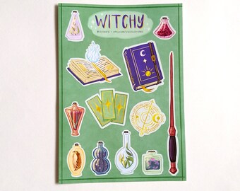 May include: A sheet of stickers with a green background featuring various witchy illustrations, including a book with a crescent moon, a wand, a potion bottle, and tarot cards. The text "Witchy" is at the top of the sheet.