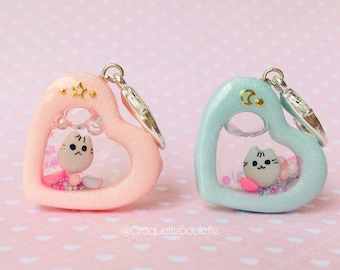 Charm shaker Pusheen en forma de corazón rosa o azul para llavero o bolso, fabricado en arcilla polimérica y resina ultravioleta